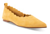 yellow pointed to flat shoe with scallop details